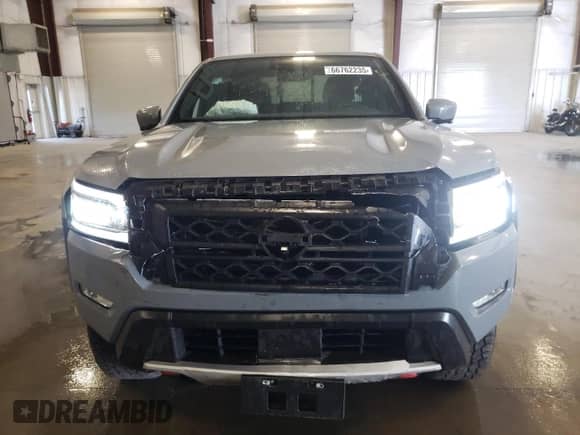 2024 Nissan Frontier Pro-4X z VIN 1N6ED1EK9RN626265, wystawiony jako Copart lot #66762235 z przebiegiem 19 773 mil mil oraz Szkoda całkowita • Salvage title. Historia ofert i sprzedaży dostępna na DreamBid. Obrazek 5.