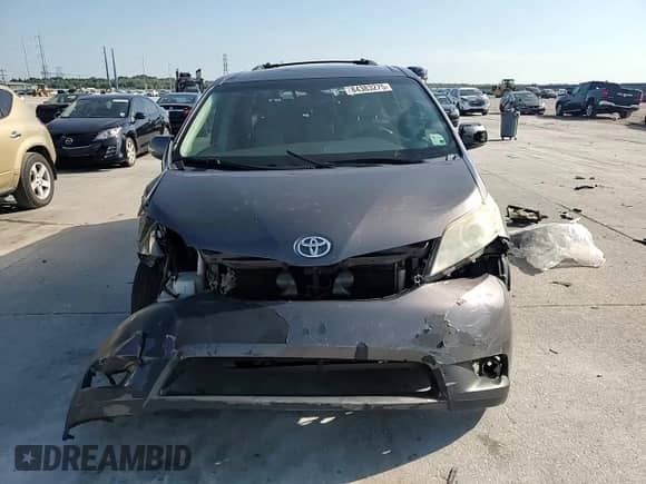 2012 Toyota Sienna XLE с VIN 5TDYK3DC8CS244970, выставлен на аукционе Copart как лот 84383275 с пробегом Не указан миль и Списание • Salvage title. История ставок и продаж доступна на DreamBid. Изображение 14.