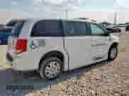 2017 Dodge Grand Caravan SE with VIN 2C7WDGBG9HR802259, listed as a Copart auction lot 68463275 with 136,353 mi miles and Salvage title. Bid and sale history available at DreamBid. Image 3.