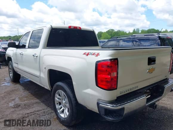 2014 Chevrolet Silverado 1500 LTZ with VIN 3GCUKSEC3EG312519, listed as a IAAI auction lot 42248191 with 141,707 mi miles and . Bid and sale history available at DreamBid. Image 3.