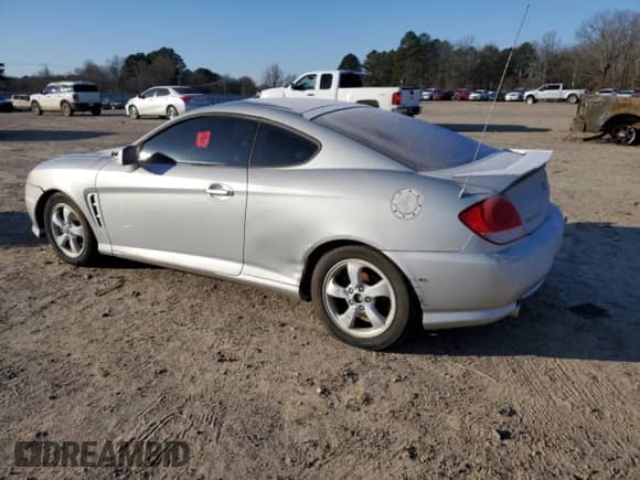 2006 Hyundai Tiburon GS с VIN KMHHM65D56U212346, выставлен на аукционе Copart как лот 87543845 с пробегом 181 605 миль миль и Чистый • Clean title. История ставок и продаж доступна на DreamBid. Изображение 2.