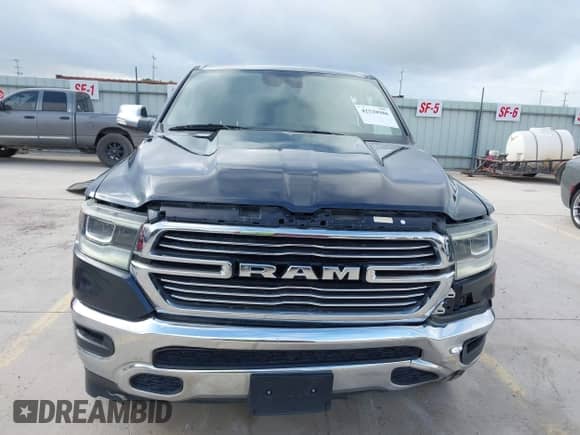 2021 Ram 1500 Laramie with VIN 1C6RREJT4MN821315, listed as a IAAI auction lot 42528986 with 88,959 mi miles and . Bid and sale history available at DreamBid. Image 13.