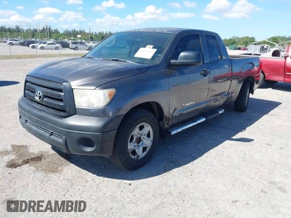 2012 Toyota Tundra z VIN 5TFRU5F19CX026861, wystawiony jako IAAI lot #41827542 z przebiegiem 135 428 mil mil oraz . Historia ofert i sprzedaży dostępna na DreamBid. Obrazek 2.