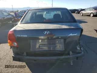 2005 Hyundai Accent GLS с VIN KMHCG45C95U665574, выставлен на аукционе Copart как лот 82603804 с пробегом 154 187 миль миль и Списание • Salvage title. История ставок и продаж доступна на DreamBid. Изображение 6.