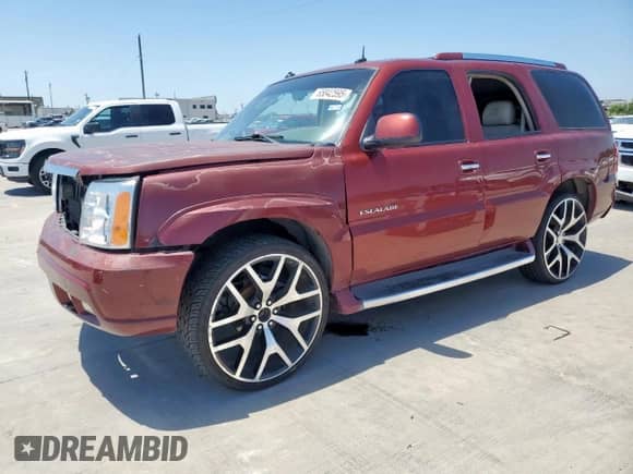 2002 Cadillac Escalade with VIN 1GYEK63N32R185132, listed as a Copart auction lot 65842595 with 228,993 mi miles and Salvage title. Bid and sale history available at DreamBid. Image 1.