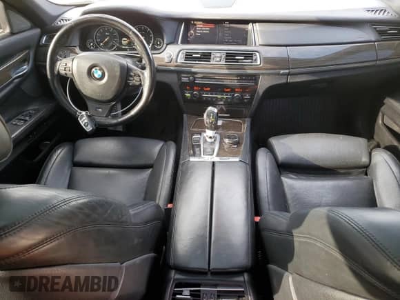 2015 BMW 7 Series 750i xDrive with VIN WBAYB6C50FD225492, listed as a Copart auction lot 50018225 with 76,059 mi miles and Salvage title. Bid and sale history available at DreamBid. Image 8.