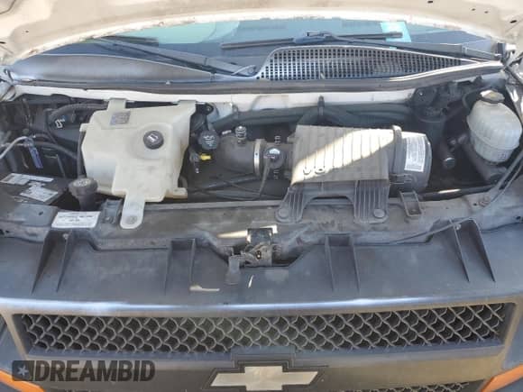 2004 Chevrolet Express Cargo с VIN 1GCFG15X841140041, выставлен на аукционе Copart как лот 41651635 с пробегом 171 503 миль миль и Списание • Salvage title. История ставок и продаж доступна на DreamBid. Изображение 12.