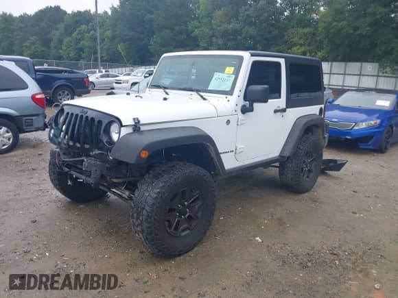2015 Jeep Wrangler Sport with VIN 1C4AJWAG1FL593777, listed as a IAAI auction lot 42952137 with 99,393 mi miles and . Bid and sale history available at DreamBid. Image 18.