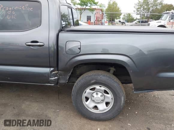 2023 Toyota Tacoma SR with VIN 3TMCZ5ANXPM538495, listed as a IAAI auction lot 42993850 with 41,728 mi miles and . Bid and sale history available at DreamBid. Image 6.
