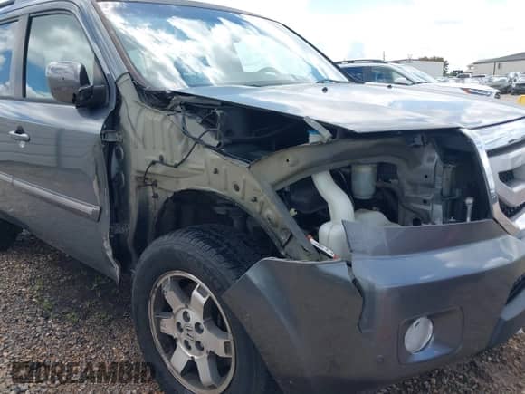 2010 Honda Pilot Touring with VIN 5FNYF3H9XAB008986, listed as a IAAI auction lot 42488828 with 126,662 mi miles and . Bid and sale history available at DreamBid. Image 6.