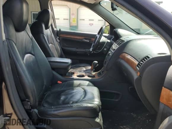 2009 Saturn Outlook XR with VIN 5GZER23D39J108317, listed as a Copart auction lot 66193775 with 243,038 mi miles and Salvage title. Bid and sale history available at DreamBid. Image 7.