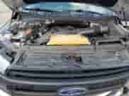 2018 Ford F-150 XL z VIN 1FTFX1EG4JKD65451, wystawiony jako Copart lot #65005995 z przebiegiem 154 053 mil mil oraz Szkoda całkowita • Salvage title. Historia ofert i sprzedaży dostępna na DreamBid. Obrazek 11.