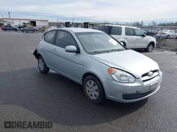 2010 Hyundai Accent GS z VIN KMHCM3AC4AU180214, wystawiony jako IAAI lot #41966496 z przebiegiem 154 392 mil mil oraz . Historia ofert i sprzedaży dostępna na DreamBid. Obrazek 1.