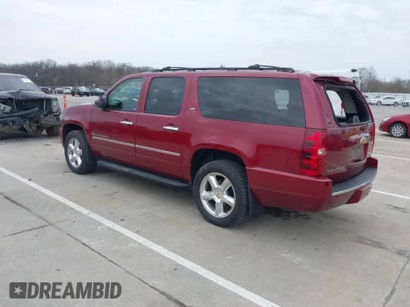 2009 Chevrolet Suburban LTZ z VIN 1GNFK36309J105434, wystawiony jako IAAI lot #42062907 z przebiegiem 132 674 mil mil oraz . Historia ofert i sprzedaży dostępna na DreamBid. Obrazek 3.