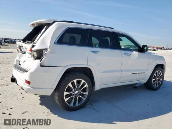 2017 Jeep Grand Cherokee Overland with VIN 1C4RJECG4HC965657, listed as a Copart auction lot 84400635 with 141,055 mi miles and Salvage title. Bid and sale history available at DreamBid. Image 3.
