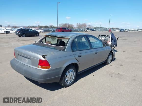1999 Saturn SL with VIN 1G8ZH5282XZ169243, listed as a IAAI auction lot 41859519 with 224,157 mi miles and . Bid and sale history available at DreamBid. Image 4.