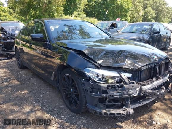 2019 BMW 5 Series 530i xDrive with VIN WBAJA7C55KG909845, listed as a IAAI auction lot 42793369 with 81,702 mi miles and . Bid and sale history available at DreamBid. Image 6.