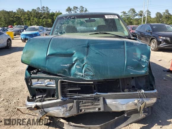 1998 GMC Sierra 1500 z VIN 1GTEC19W4WE521888, wystawiony jako Copart lot #53161505 z przebiegiem 985 004 mil mil oraz Szkoda całkowita • Salvage title. Historia ofert i sprzedaży dostępna na DreamBid. Obrazek 5.