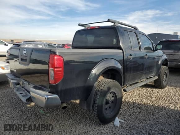 2005 Nissan Frontier Nismo with VIN 1N6AD07W65C406340, listed as a Copart auction lot 84442064 with 199,868 mi miles and Salvage title. Bid and sale history available at DreamBid. Image 3.