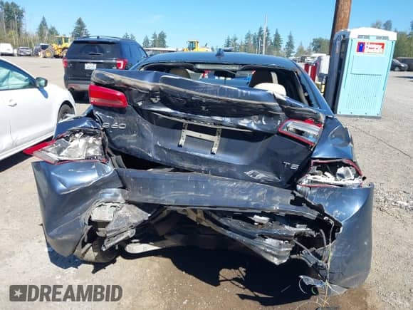 2015 Volvo S60 T5 Drive-E Premier with VIN YV126MFB5F1299795, listed as a IAAI auction lot 43052703 with 100,066 mi miles and . Bid and sale history available at DreamBid. Image 16.