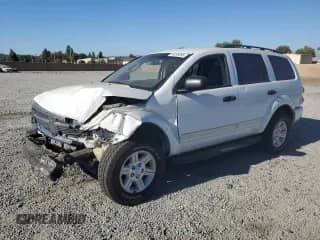 2005 Dodge Durango SLT with VIN 1D4HD48N55F509880, listed as a Copart auction lot 69296595 with 109,729 mi miles and Salvage title. Bid and sale history available at DreamBid. Image 1.