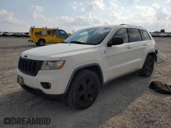 2011 Jeep Grand Cherokee Laredo с VIN 1J4RR4GG2BC617838, выставлен на аукционе Copart как лот 72069035 с пробегом 186 984 миль миль и Списание • Salvage title. История ставок и продаж доступна на DreamBid. Изображение 1.