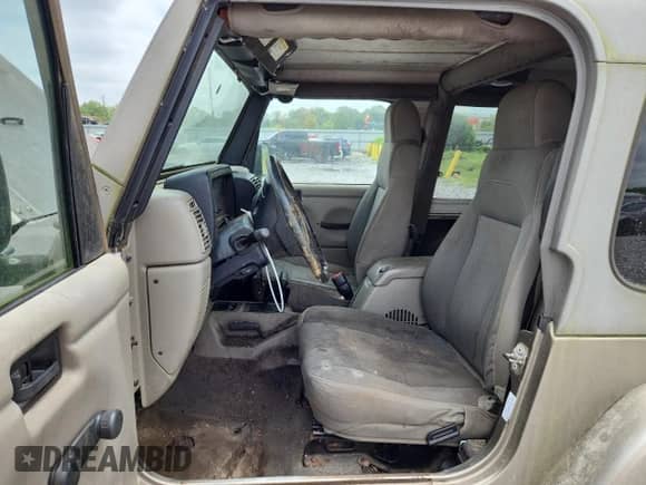 2003 Jeep Wrangler Sahara с VIN 1J4FA59S53P326956, выставлен на аукционе Copart как лот 62502585 с пробегом Не указан миль и Чистый • Clean title. История ставок и продаж доступна на DreamBid. Изображение 7.