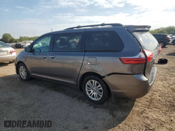 2017 Toyota Sienna XLE with VIN 5TDYZ3DC7HS899401, listed as a Copart auction lot 80454085 with 75,197 mi miles and Salvage title. Bid and sale history available at DreamBid. Image 2.