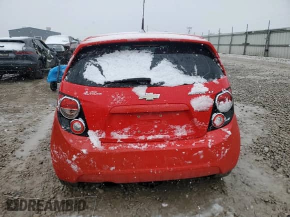 2014 Chevrolet Sonic LT с VIN 1G1JD6SB1E4198722, выставлен на аукционе Copart как лот 46170975 с пробегом 121 067 миль миль и Чистый • Clean title. История ставок и продаж доступна на DreamBid. Изображение 6.