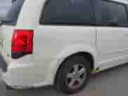 2013 Dodge Grand Caravan SXT with VIN 2C4RDGCG4DR523725, listed as a IAAI auction lot 43455537 with 195,842 mi miles and . Bid and sale history available at DreamBid. Image 6.
