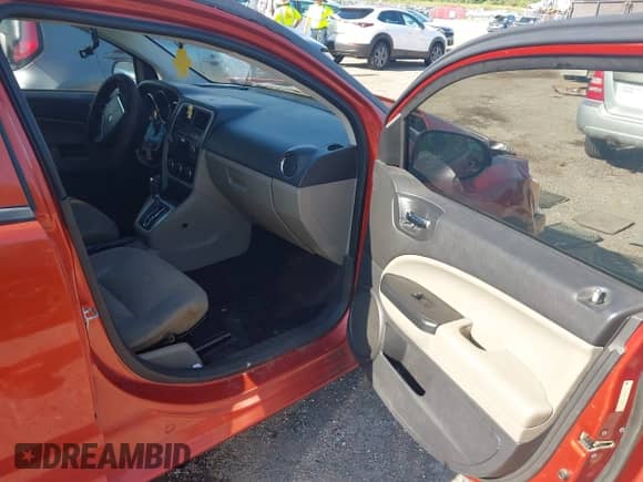 2010 Dodge Caliber SXT with VIN 1B3CB4HA4AD632362, listed as a IAAI auction lot 43130784 with 192,276 mi miles and . Bid and sale history available at DreamBid. Image 5.