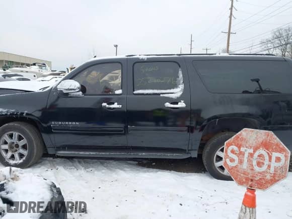 2010 Chevrolet Suburban LS with VIN 1GNUKHE37AR203811, listed as a IAAI auction lot 41304431 with Not provided miles and . Bid and sale history available at DreamBid. Image 13.