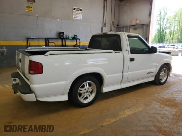 2003 Chevrolet S-10 LS с VIN 1GCCS14X138169325, выставлен на аукционе Copart как лот 52531625 с пробегом 89 181 миль миль и Списание • Salvage title. История ставок и продаж доступна на DreamBid. Изображение 3.