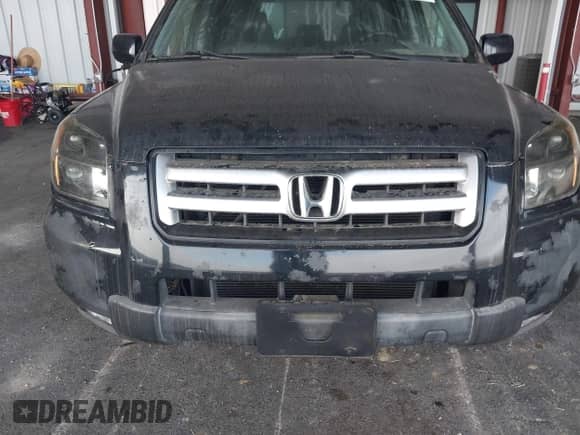 2006 Honda Pilot EX-L z VIN 2HKYF18526H501636, wystawiony jako IAAI lot #43389106 z przebiegiem 222 248 mil mil oraz . Historia ofert i sprzedaży dostępna na DreamBid. Obrazek 6.