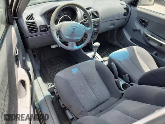 2003 Hyundai Accent GL с VIN KMHCG35C33U258812, выставлен на аукционе Copart как лот 57509245 с пробегом 153 716 миль миль и Списание • Salvage title. История ставок и продаж доступна на DreamBid. Изображение 8.