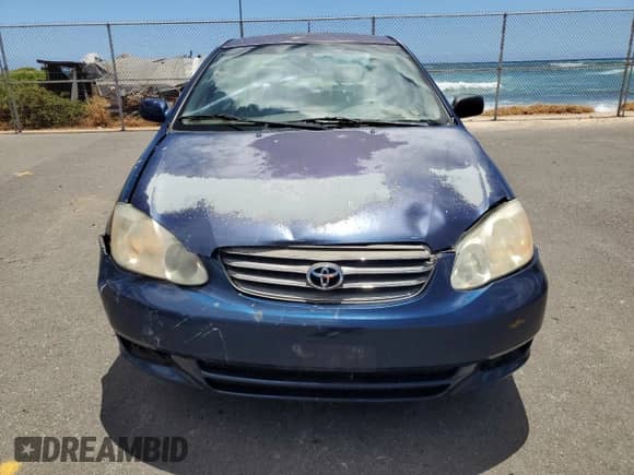 2004 Toyota Corolla CE z VIN 1NXBR32E04Z268677, wystawiony jako Copart lot #69282035 z przebiegiem 94 770 mil mil oraz Szkoda całkowita • Salvage title. Historia ofert i sprzedaży dostępna na DreamBid. Obrazek 5.