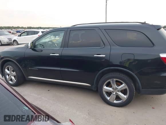 2012 Dodge Durango Citadel with VIN 1C4RDHEG5CC284891, listed as a IAAI auction lot 43164567 with 269,338 mi miles and . Bid and sale history available at DreamBid. Image 14.