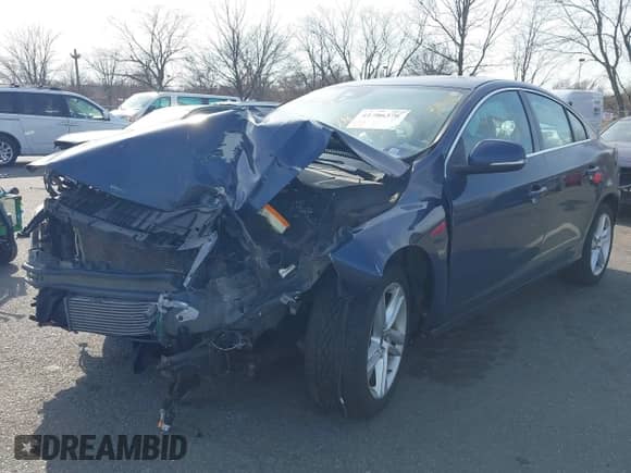 2015 Volvo S60 T5 Drive-E Premier with VIN YV126MFK1F2336609, listed as a IAAI auction lot 41786376 with 50,538 mi miles and . Bid and sale history available at DreamBid. Image 2.
