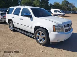 2011 Chevrolet Tahoe LTZ with VIN 1GNSCCE00BR252170, listed as a IAAI auction lot 43480102 with 201,291 mi miles and . Bid and sale history available at DreamBid. Image 1.