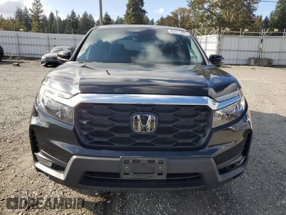 2023 Honda Passport EX-L with VIN 5FNYF8H53PB026202, listed as a Copart auction lot 82571405 with 45,325 mi miles and Salvage title. Bid and sale history available at DreamBid. Image 5.
