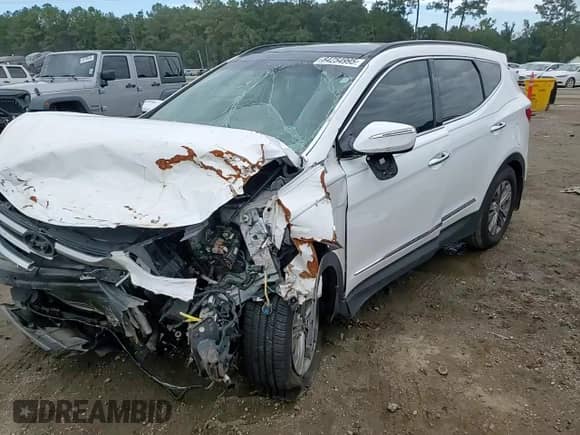 2015 Hyundai Santa Fe с VIN 5XYZU3LB6FG247486, выставлен на аукционе Copart как лот 84254995 с пробегом 109 762 миль миль и Списание • Salvage title. История ставок и продаж доступна на DreamBid. Изображение 15.