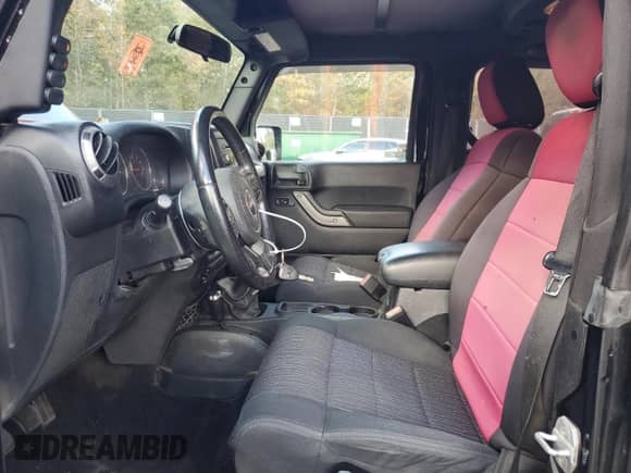2012 Jeep Wrangler Sport with VIN 1C4AJWAG4CL237299, listed as a Copart auction lot 82743155 with 226,287 mi miles and Clean title. Bid and sale history available at DreamBid. Image 7.