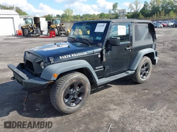 2015 Jeep Wrangler Sport with VIN 1C4AJWAG9FL769863, listed as a IAAI auction lot 43322956 with 123,518 mi miles and . Bid and sale history available at DreamBid. Image 2.