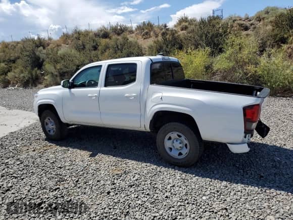 2022 Toyota Tacoma SR z VIN 3TMCZ5AN2NM522935, wystawiony jako Copart lot #69641735 z przebiegiem 89 840 mil mil oraz Szkoda całkowita • Salvage title. Historia ofert i sprzedaży dostępna na DreamBid. Obrazek 2.
