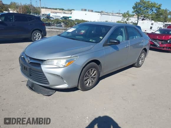 2016 Toyota Camry XLE with VIN 4T1BF1FK3GU140158, listed as a IAAI auction lot 43464478 with Not provided miles and . Bid and sale history available at DreamBid. Image 17.
