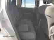 2011 Jeep Compass z VIN 1J4NF1FB1BD280813, wystawiony jako Copart lot #69636485 z przebiegiem 119 032 mil mil oraz Szkoda całkowita • Salvage title. Historia ofert i sprzedaży dostępna na DreamBid. Obrazek 11.