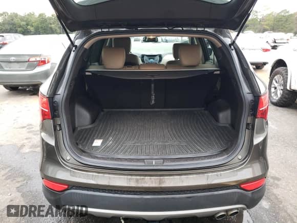 2014 Hyundai Santa Fe с VIN 5XYZU3LA3EG212720, выставлен на аукционе Copart как лот 82893124 с пробегом 134 404 миль миль и Списание • Salvage title. История ставок и продаж доступна на DreamBid. Изображение 6.