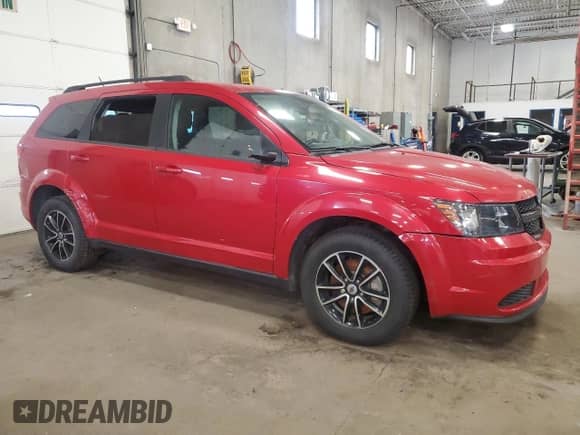 2018 Dodge Journey SE with VIN 3C4PDCAB9JT269400, listed as a Copart auction lot 85586845 with 76,410 mi miles and Clean title. Bid and sale history available at DreamBid. Image 4.