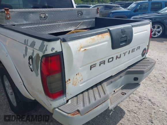 2001 Nissan Frontier SE with VIN 1N6ED27T61C324671, listed as a IAAI auction lot 42403537 with 190,638 mi miles and . Bid and sale history available at DreamBid. Image 19.