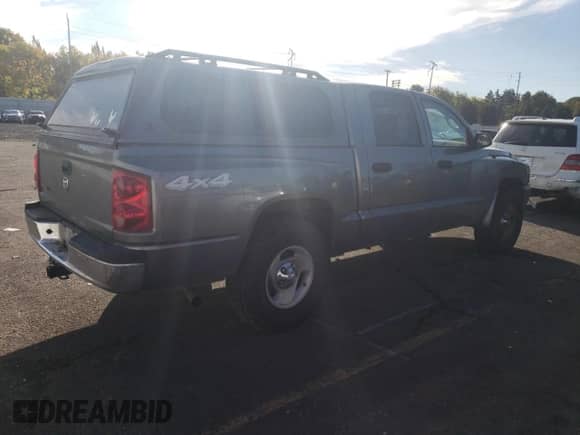 2006 Dodge Dakota ST с VIN 1D7HW28K96S716210, выставлен на аукционе Copart как лот 77416344 с пробегом 115 973 миль миль и Списание • Salvage title. История ставок и продаж доступна на DreamBid. Изображение 3.